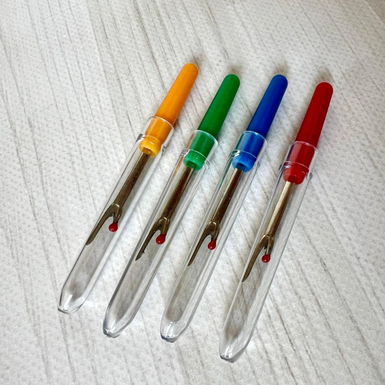 Розпорювач з прозорим ковпачком