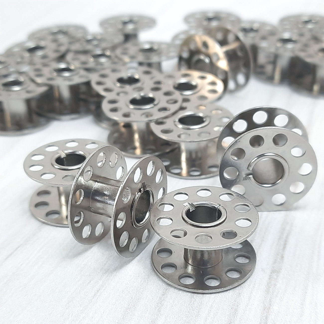 Шпульки для побутових швейних машин (21х11 мм) металеві