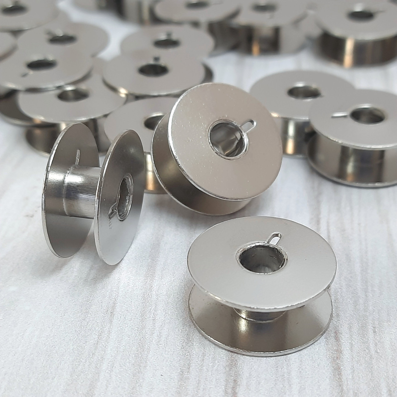 Шпульки для промислових швейних машин (21х8 мм) металеві