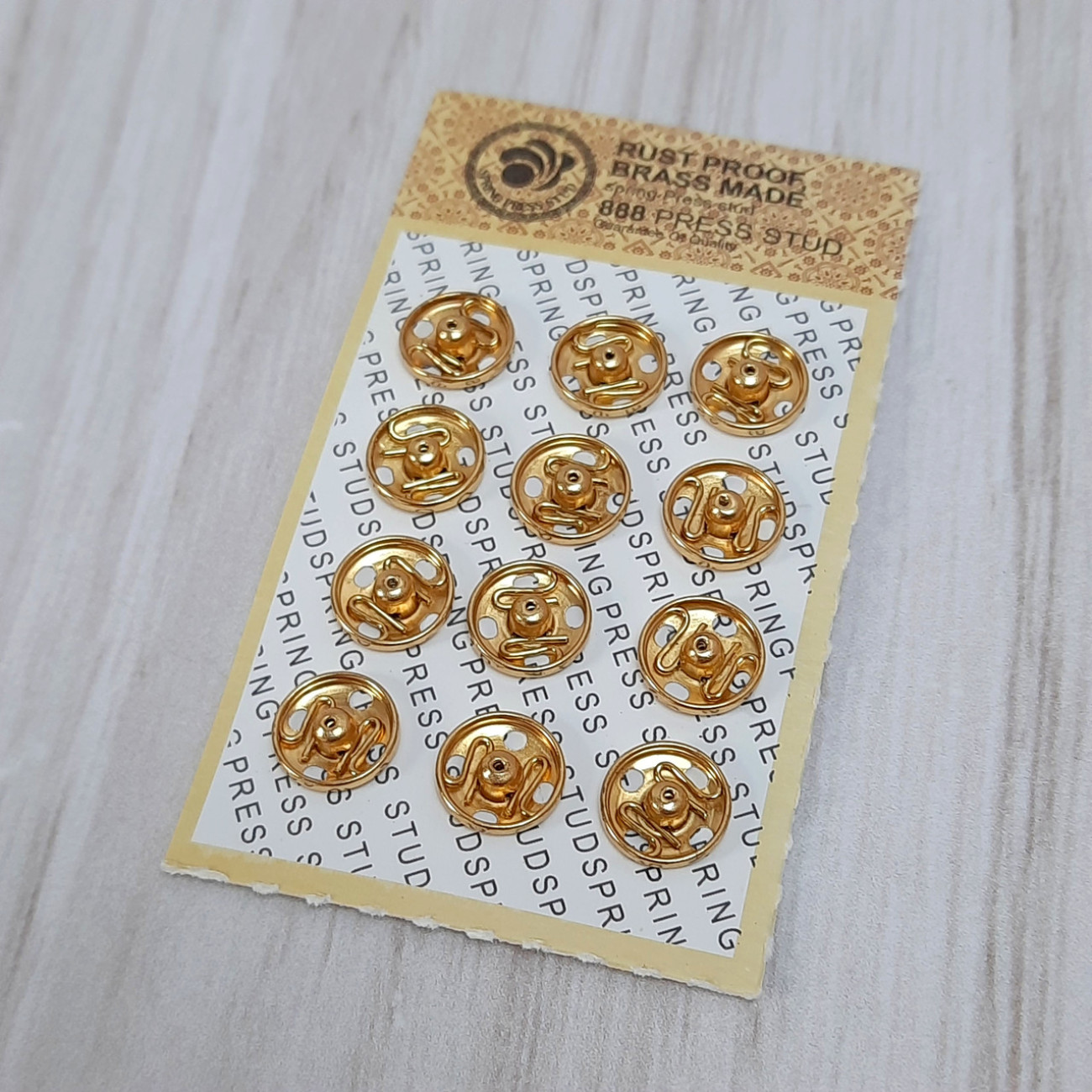 Набір кнопок пришивних металевих 10 мм золотистих (12шт)