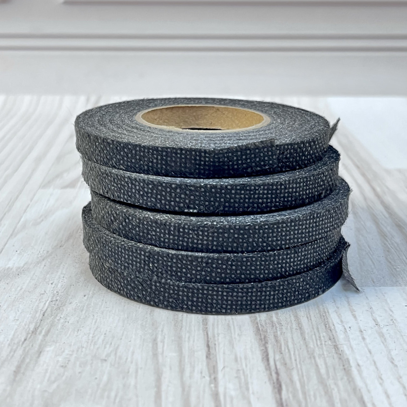 Тасьма клейова ниткопрошивна по косій 8мм, чорна