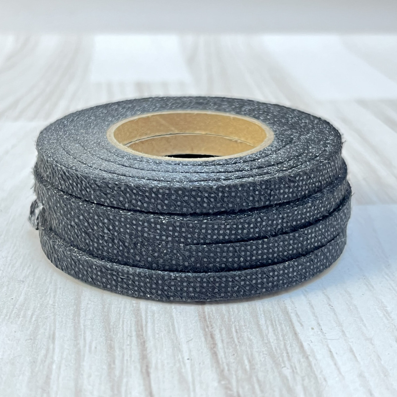 Тасьма клейова ниткопрошивна по косій 6мм, чорна