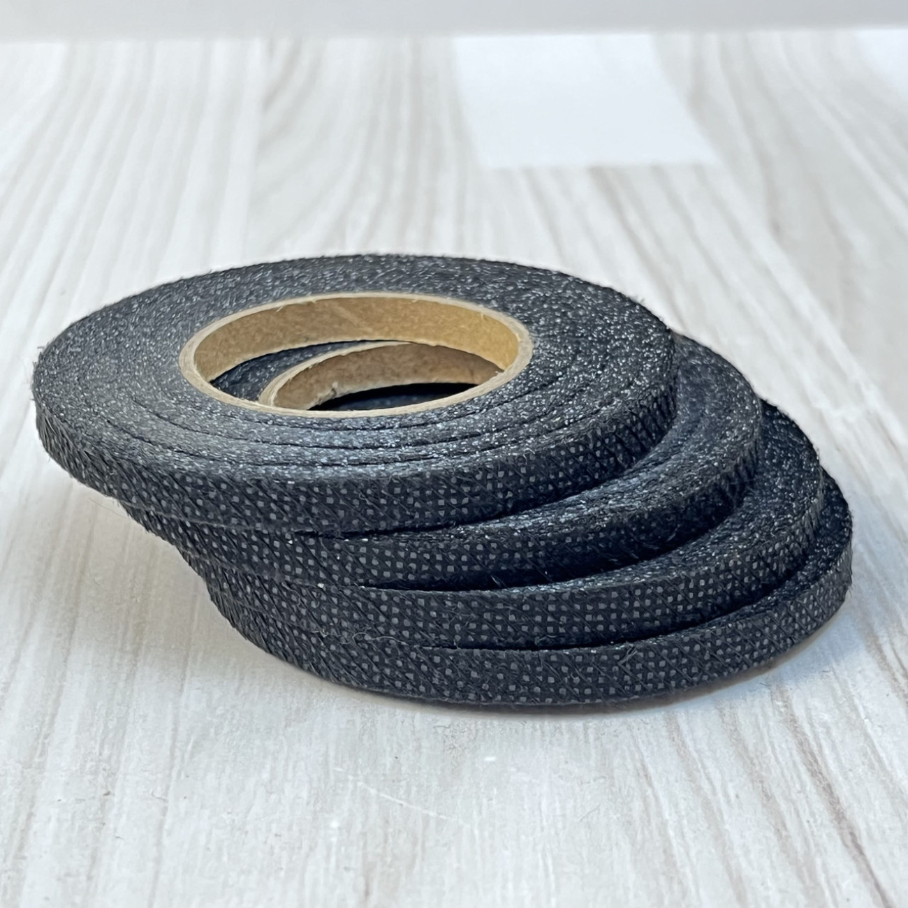 Тасьма клейова ниткопрошивна по косій 6мм, чорна