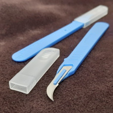 Розпорювач швів вигнутий синій