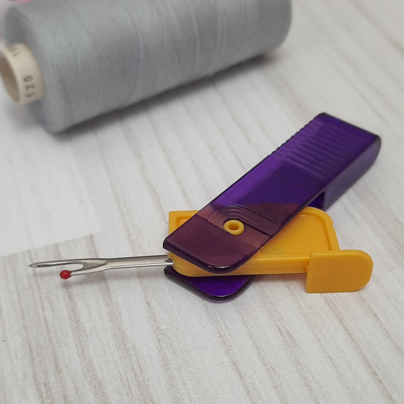 Розпорювач розкладний фіолетово-жовтий
