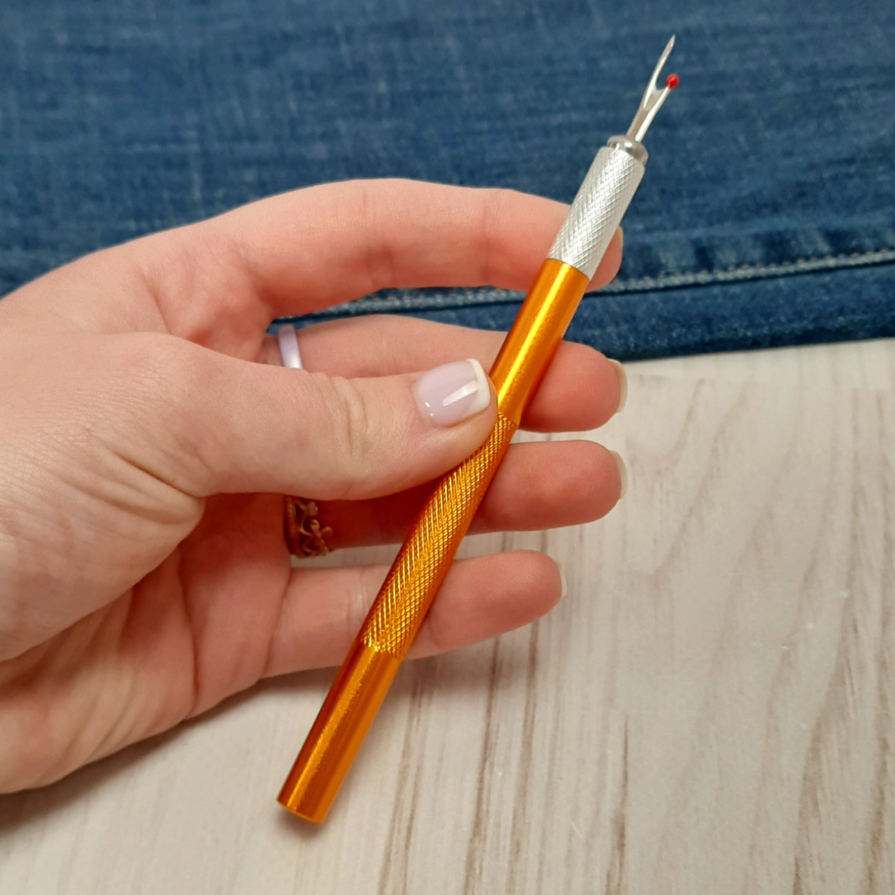 Розпорювач металевий зі змінними лезами (помаранчевий)