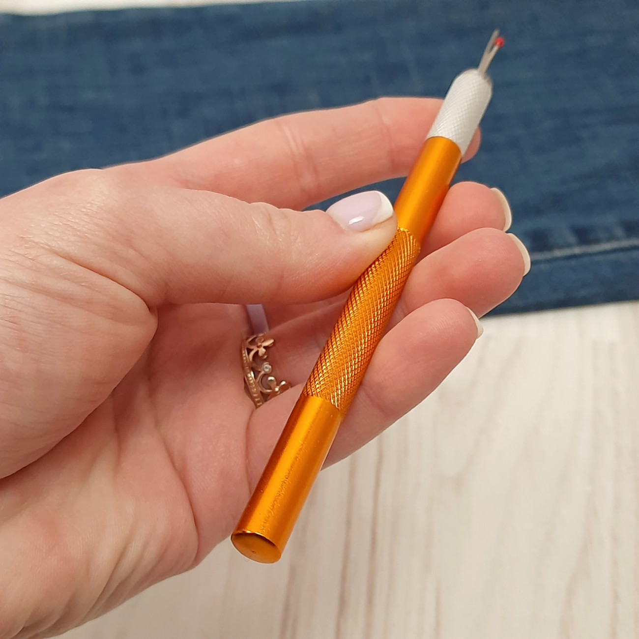 Розпорювач металевий зі змінними лезами (помаранчевий)