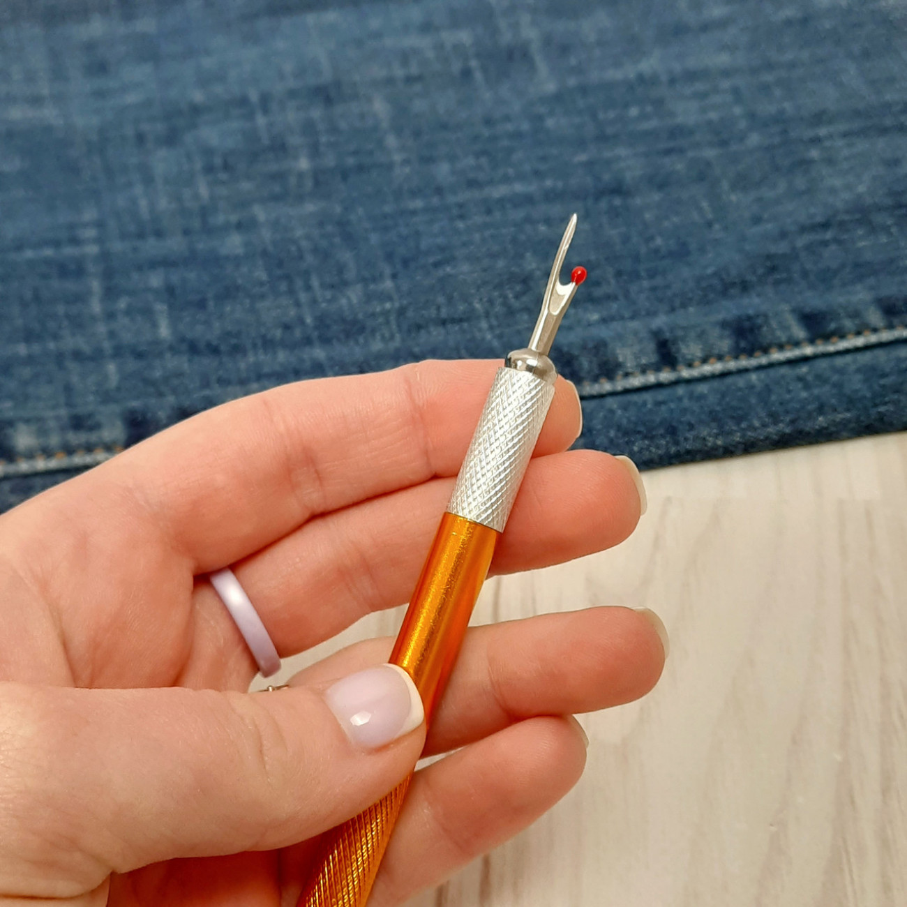 Розпорювач металевий зі змінними лезами (помаранчевий)