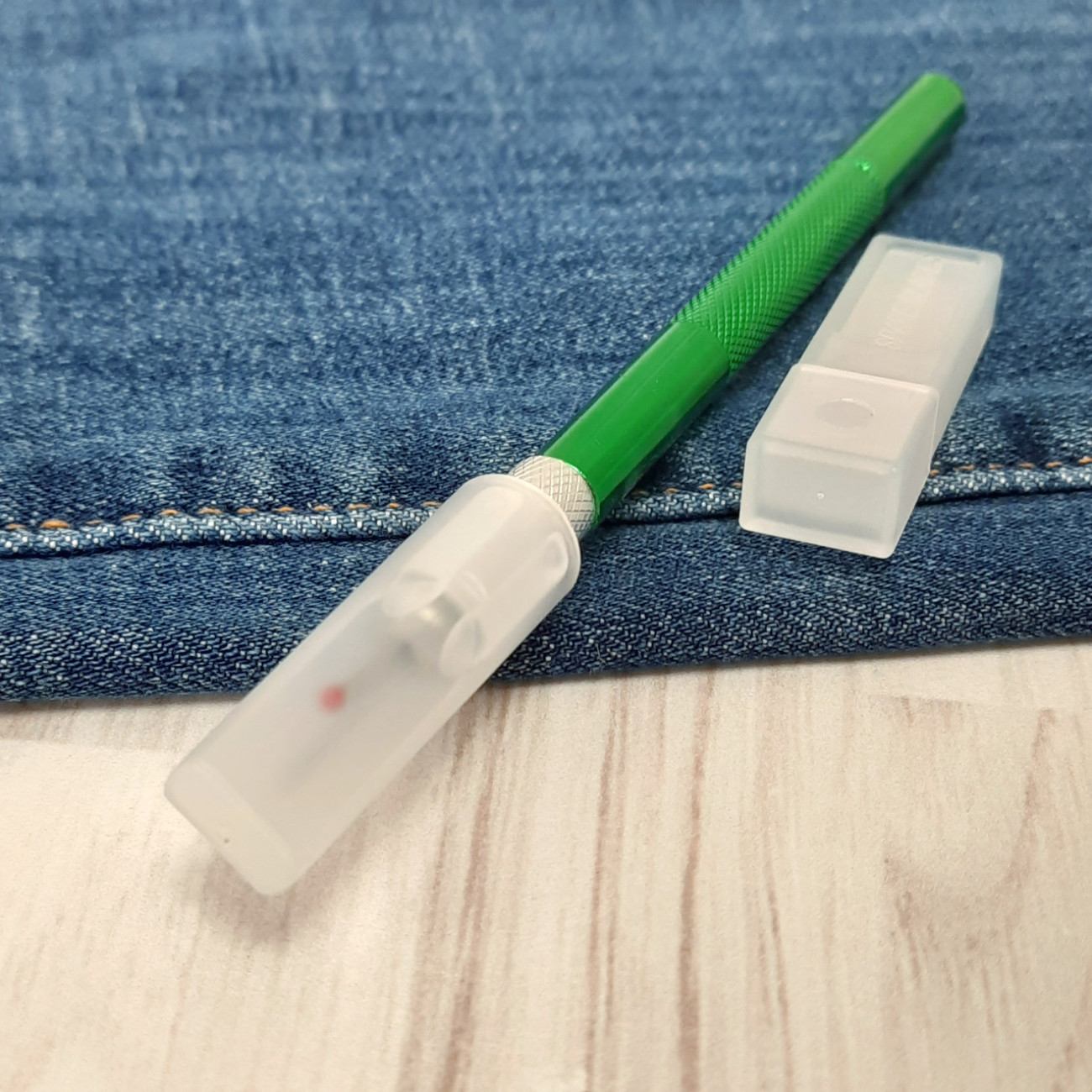 Розпорювач металевий зі змінними лезами (зелений)