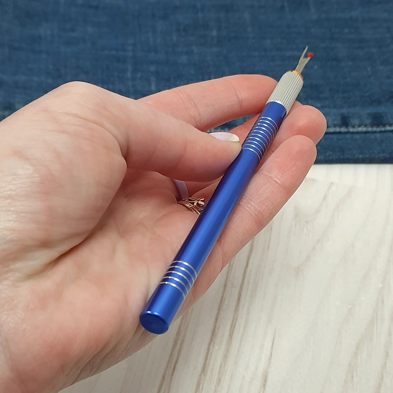 Розпорювач металевий зі змінними лезами (синій)