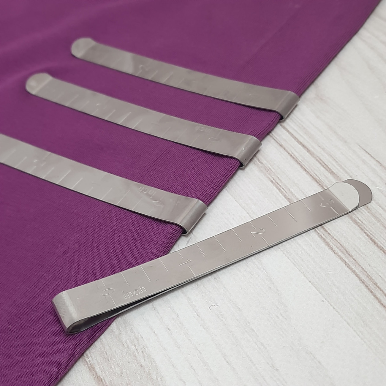 Затискач кравецький з лінійкою