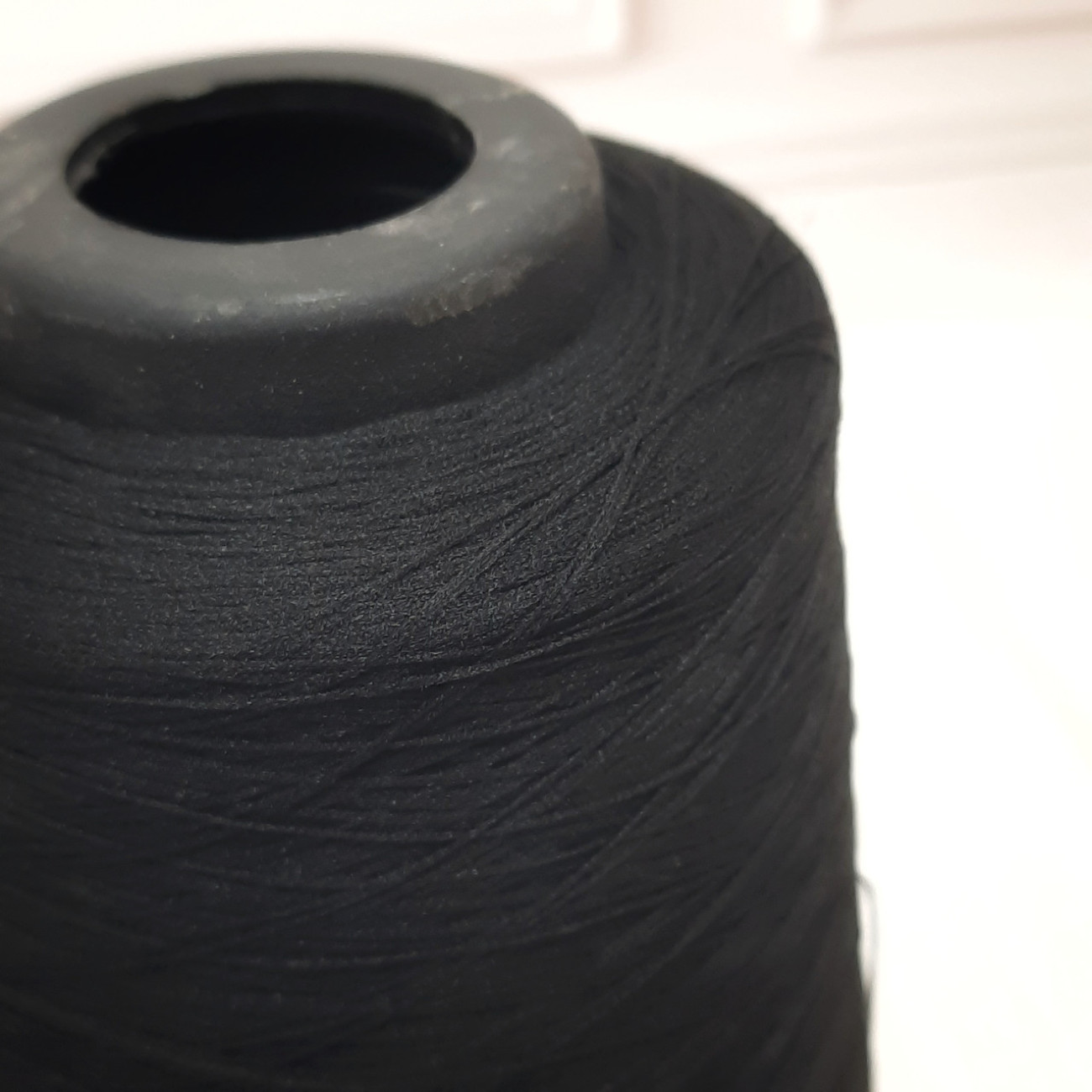 Текстуровані нитки для оверлока 150D/1, чорні