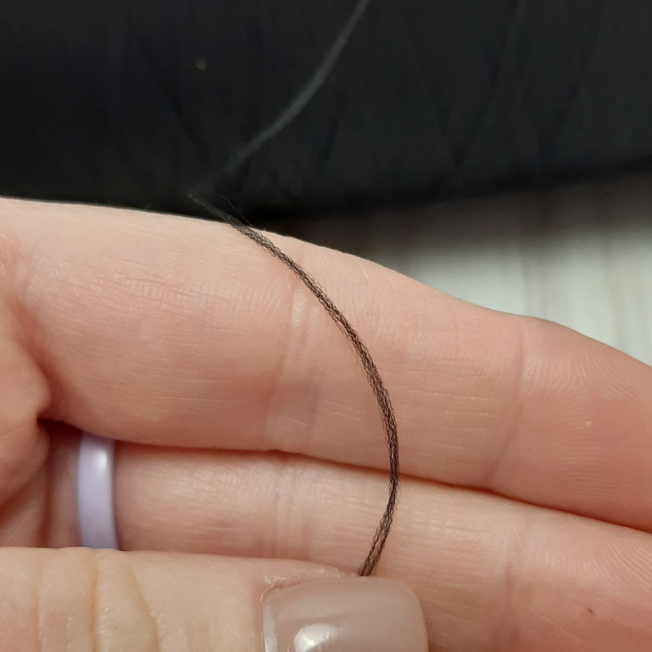 Текстуровані нитки для оверлока 150D/1, чорні