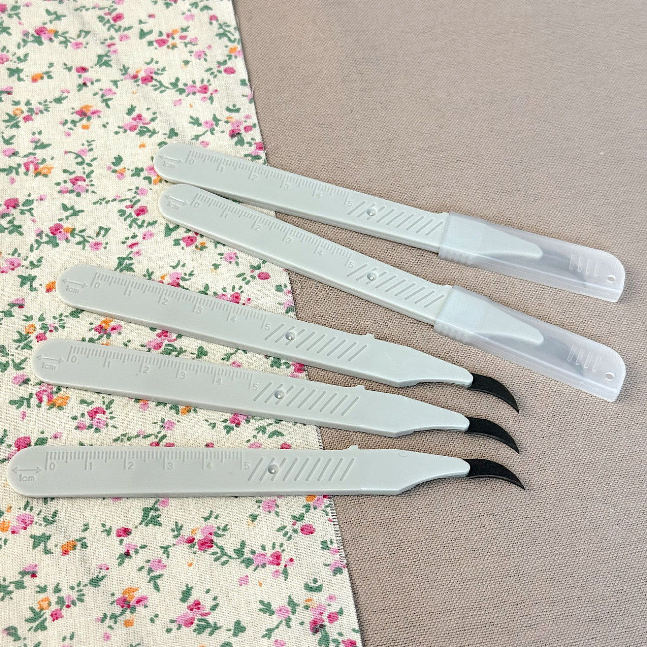 Розпорювач швів вигнутий молочний