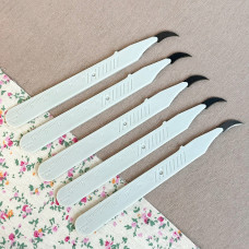 Розпорювач швів вигнутий молочний