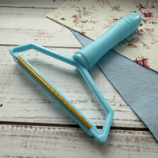 Щітка-бритва для видалення катишків і ворса