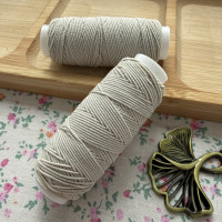 Нитка-резинка (спандекс), сіра