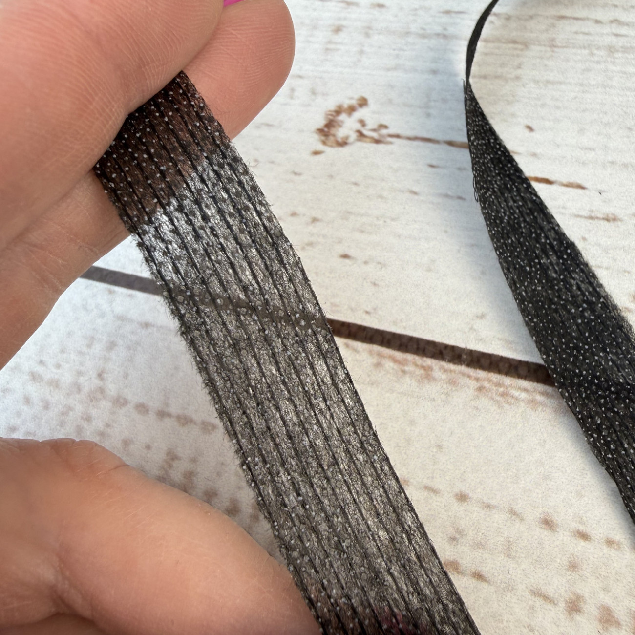 Тасьма ниткопрошивна клейова дольова, 15 мм, чорна, моток 100м