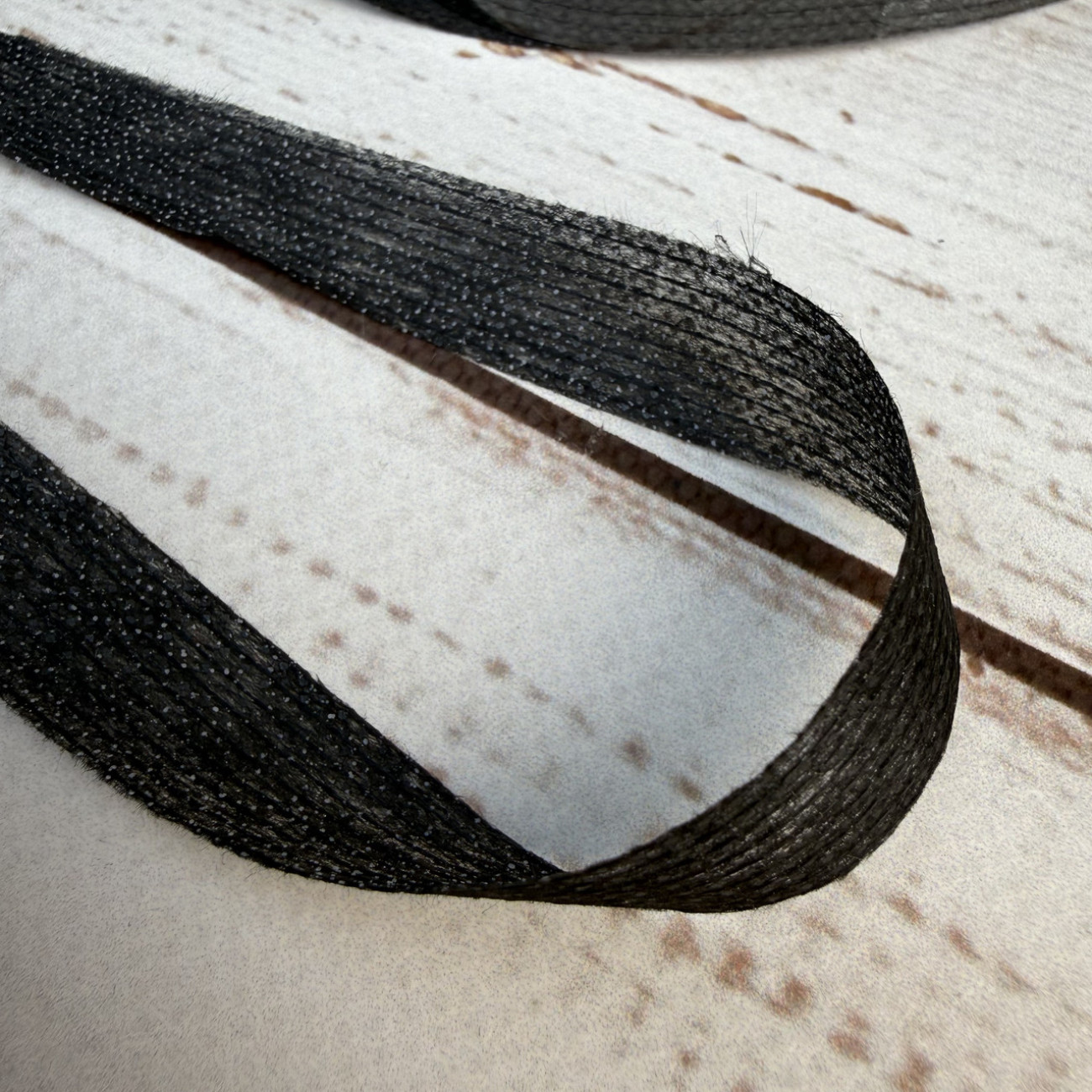 Тасьма ниткопрошивна клейова дольова, 15 мм, чорна, моток 100м