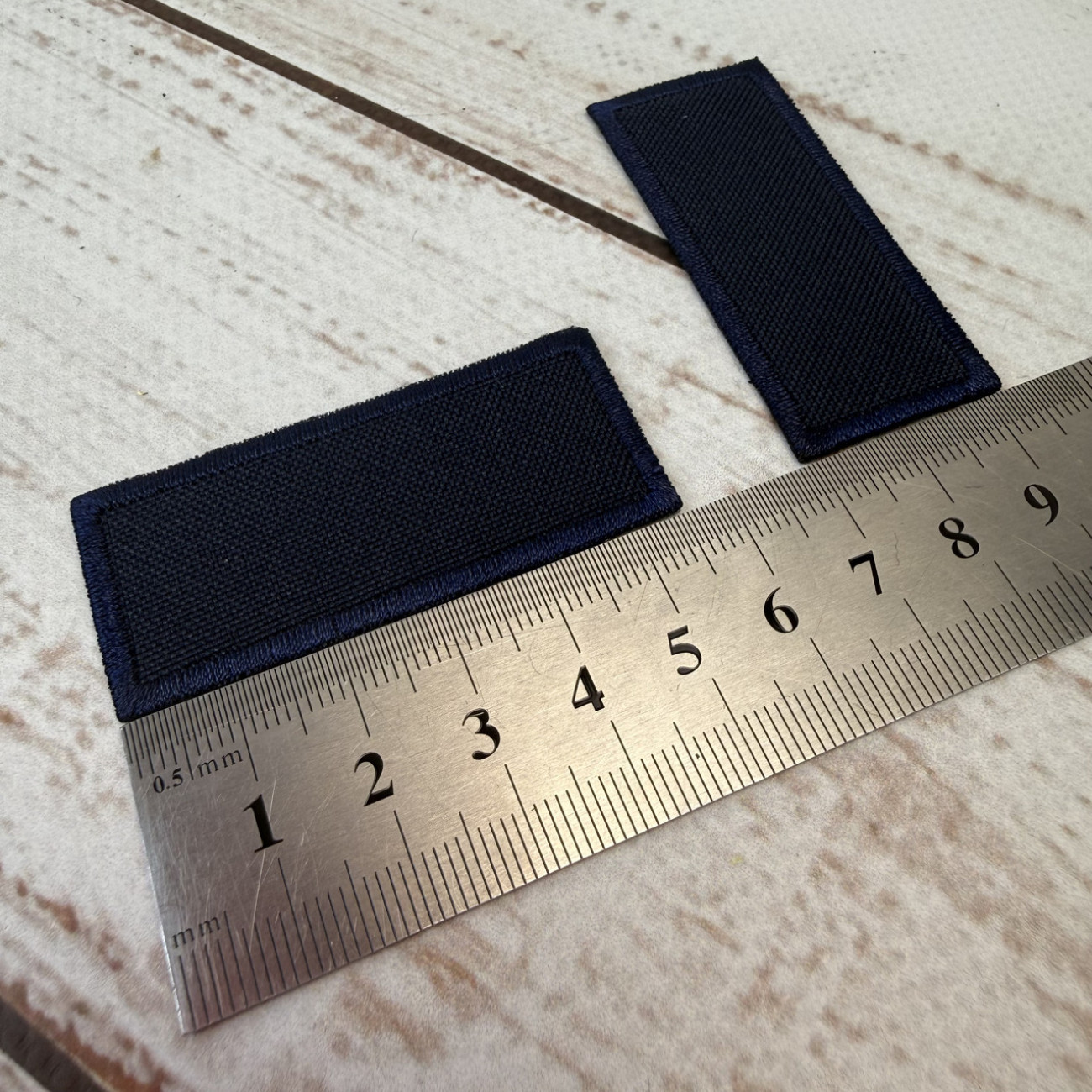 Нашивка клейова (термоаплікація) прямокутна темно-синя 55×23 мм