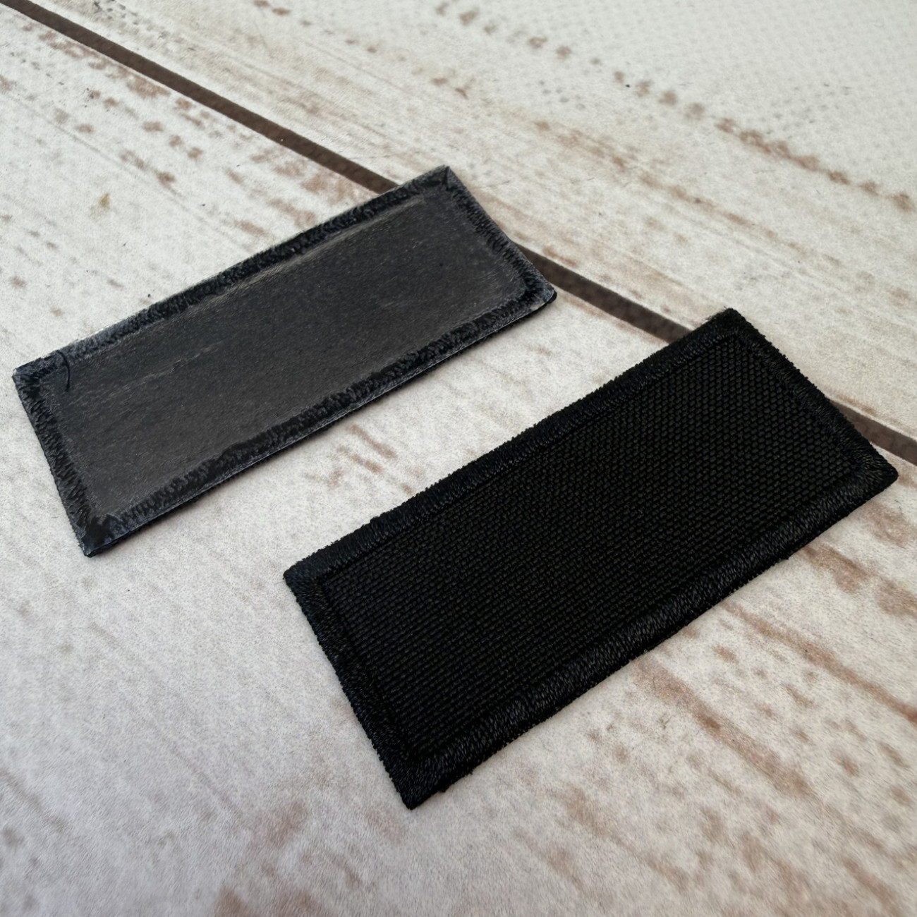 Нашивка клейова (термоаплікація) прямокутна чорна 55×23 мм