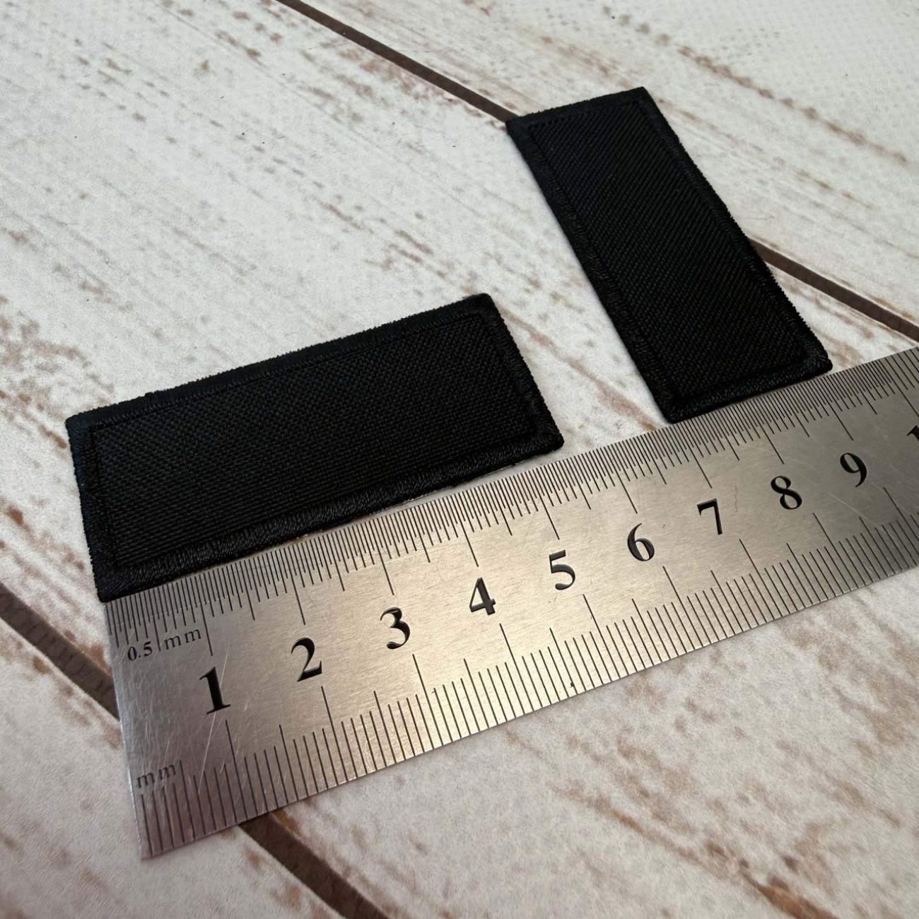 Нашивка клейова (термоаплікація) прямокутна чорна 55×23 мм