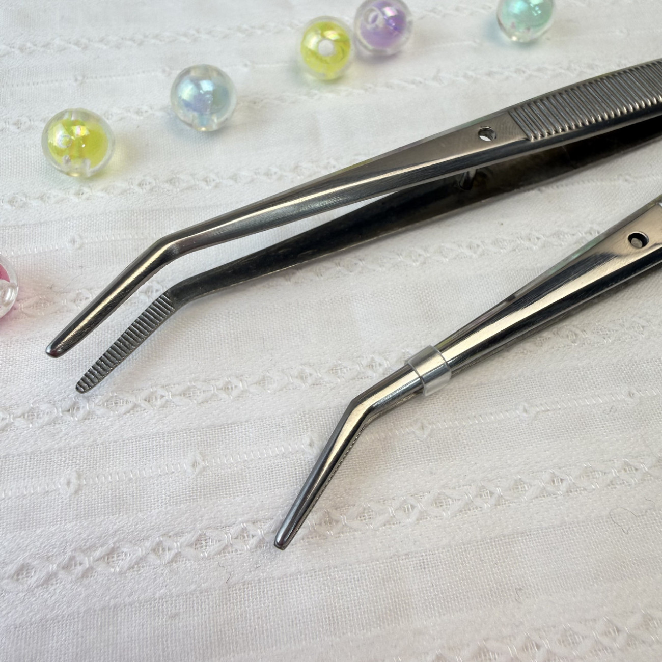 Пінцет вигнутий TWEEZER TWE-6 з рефленими насічками, сріблястий