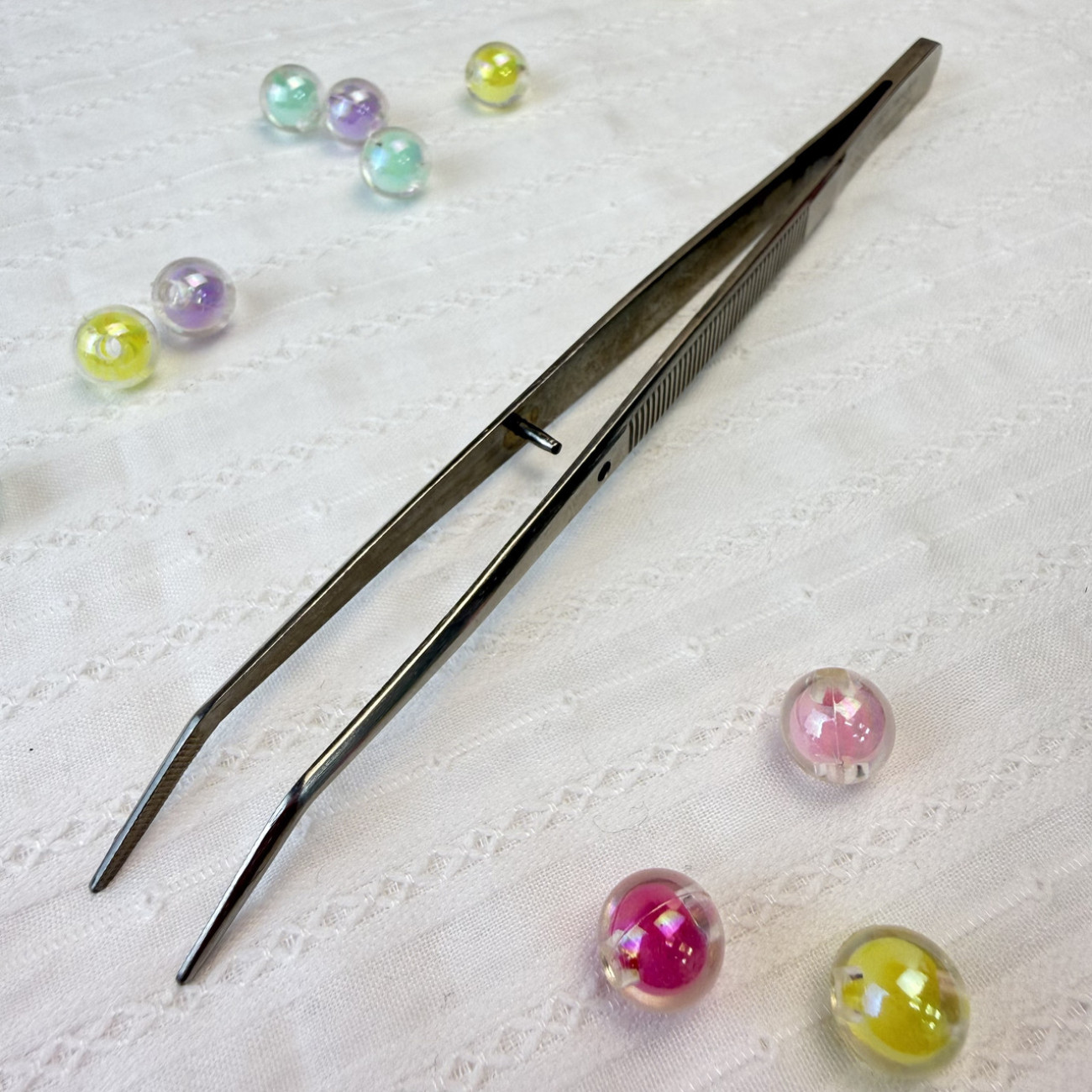 Пінцет вигнутий TWEEZER TWE-6 з рефленими насічками, сріблястий