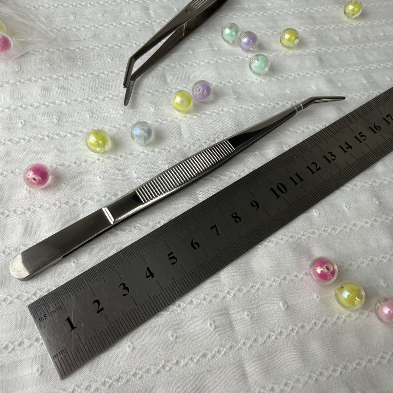 Пінцет вигнутий TWEEZER TWE-6 з рефленими насічками, сріблястий